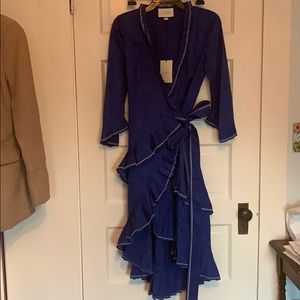 Blue wrap dress with white embroidery